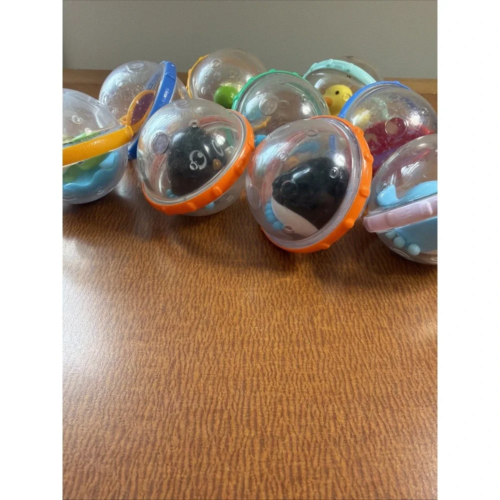 Munchkin Balls Rattles Turtle Penguin Spinner Toys Lot of 9 Baby Bath & Sensory